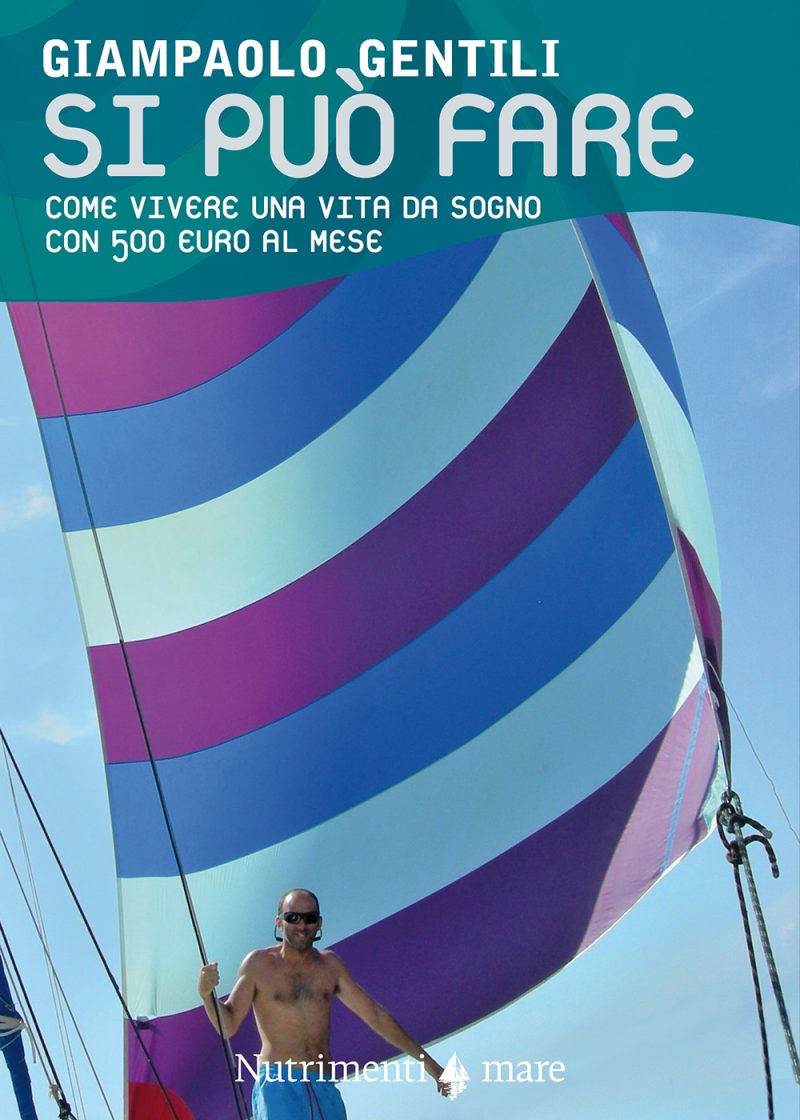 In copertina foto dell’autore davanti allo spi spiegato al vento