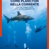 Nella foto di copertina quattro sub in immersione, solo uno di loro si accorge del passaggio dello squalo.